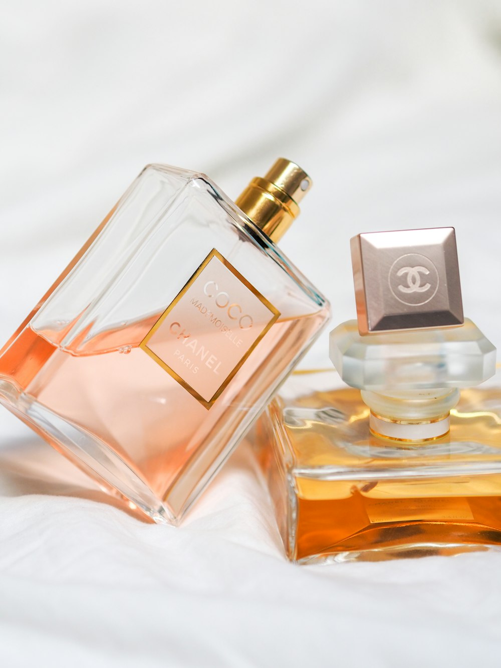 clear glass perfume bottle with gold lid