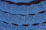 Close-up of depth filtration membrane structure highlighting pore complexity in elegant indigo hues.