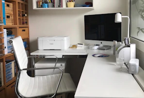 Home office setup featuring a top-rated compact printer and wireless devices