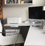 white printer on white table