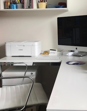 white printer on white table