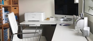 white printer on white table