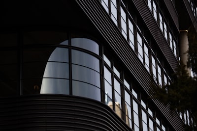 black and white concrete building emotionally charged zoom background