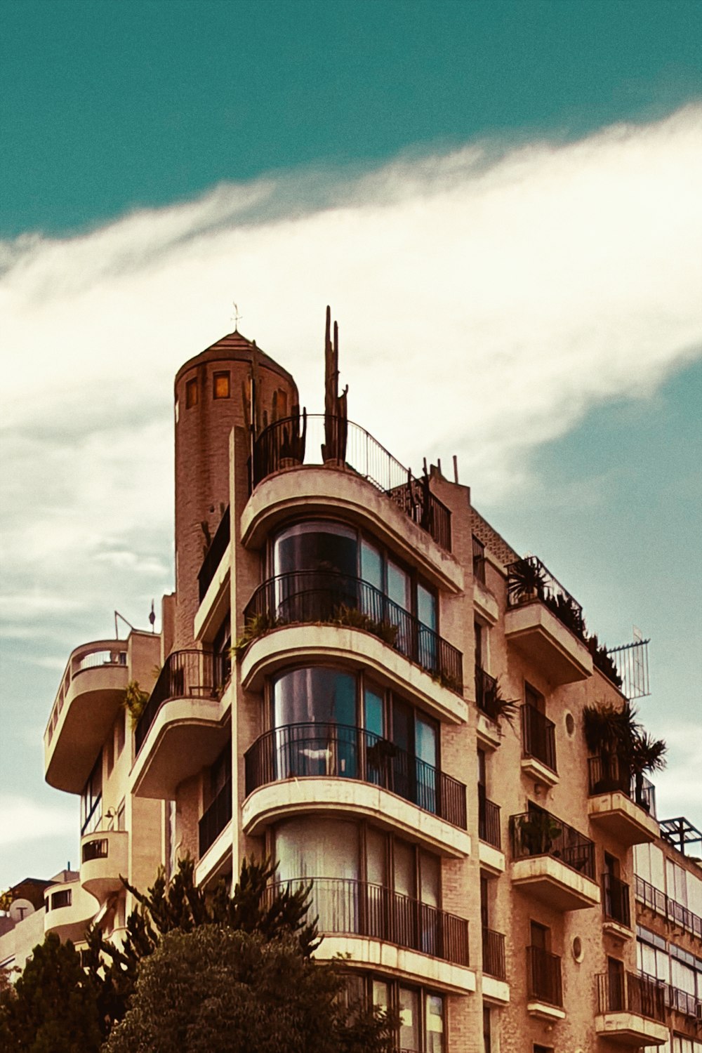 brown concrete building under blue sky during daytime