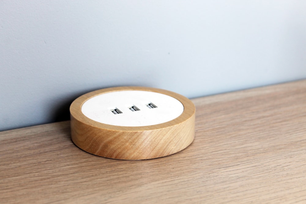 brown wooden round ornament on brown wooden table