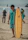 Man with sunhat and dead palm tank top leaning against a colorful surfboard by the ocean.