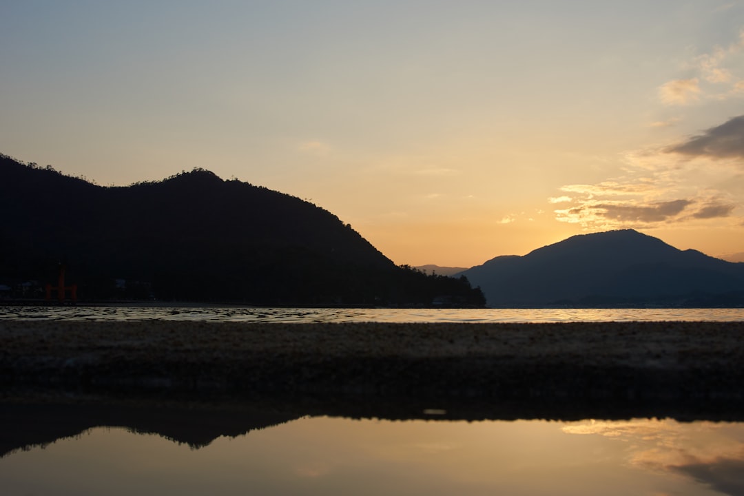 silhouette of mountain during sunset