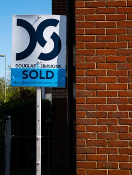 blue and white no smoking sign