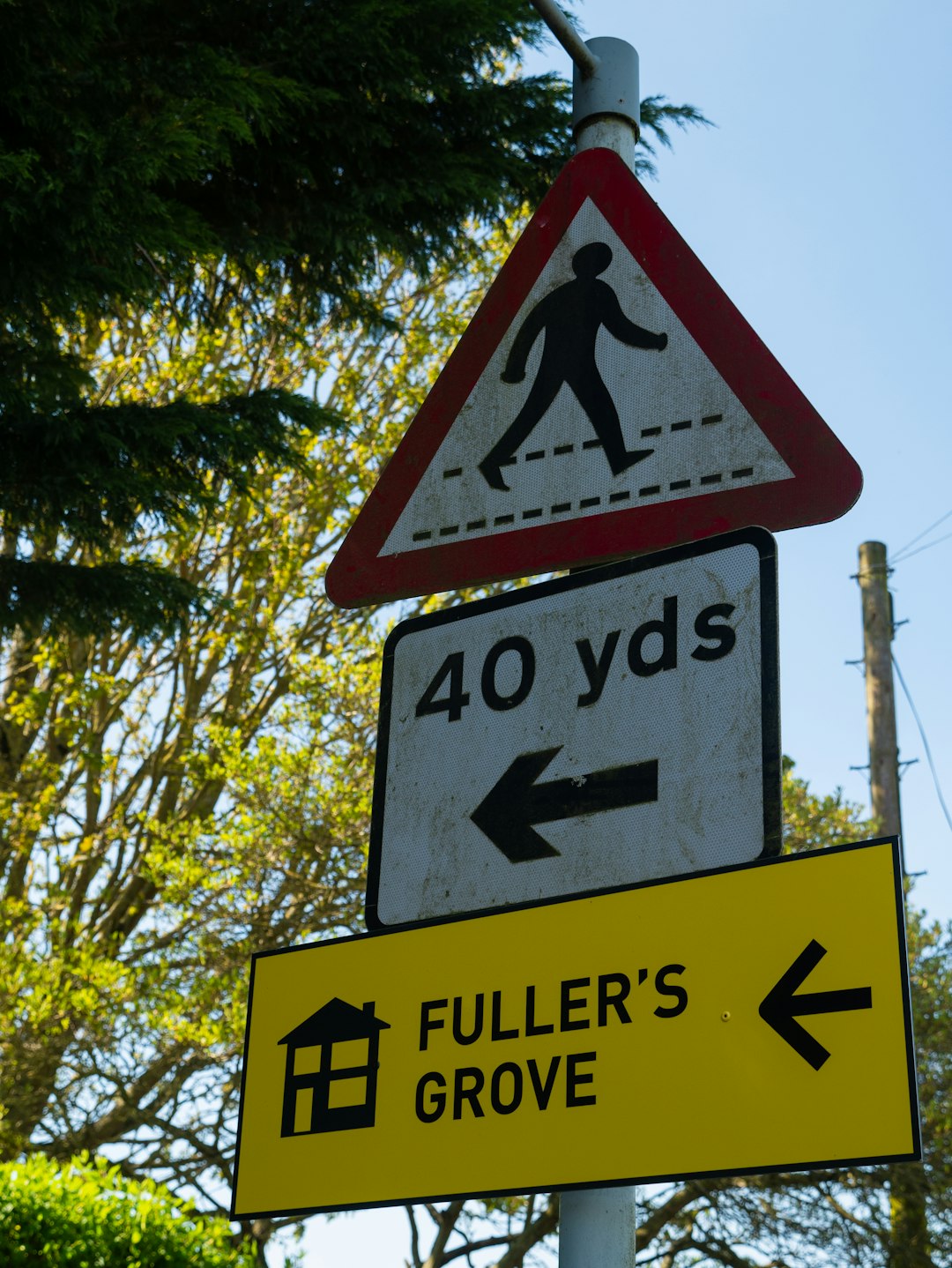 black and yellow street sign