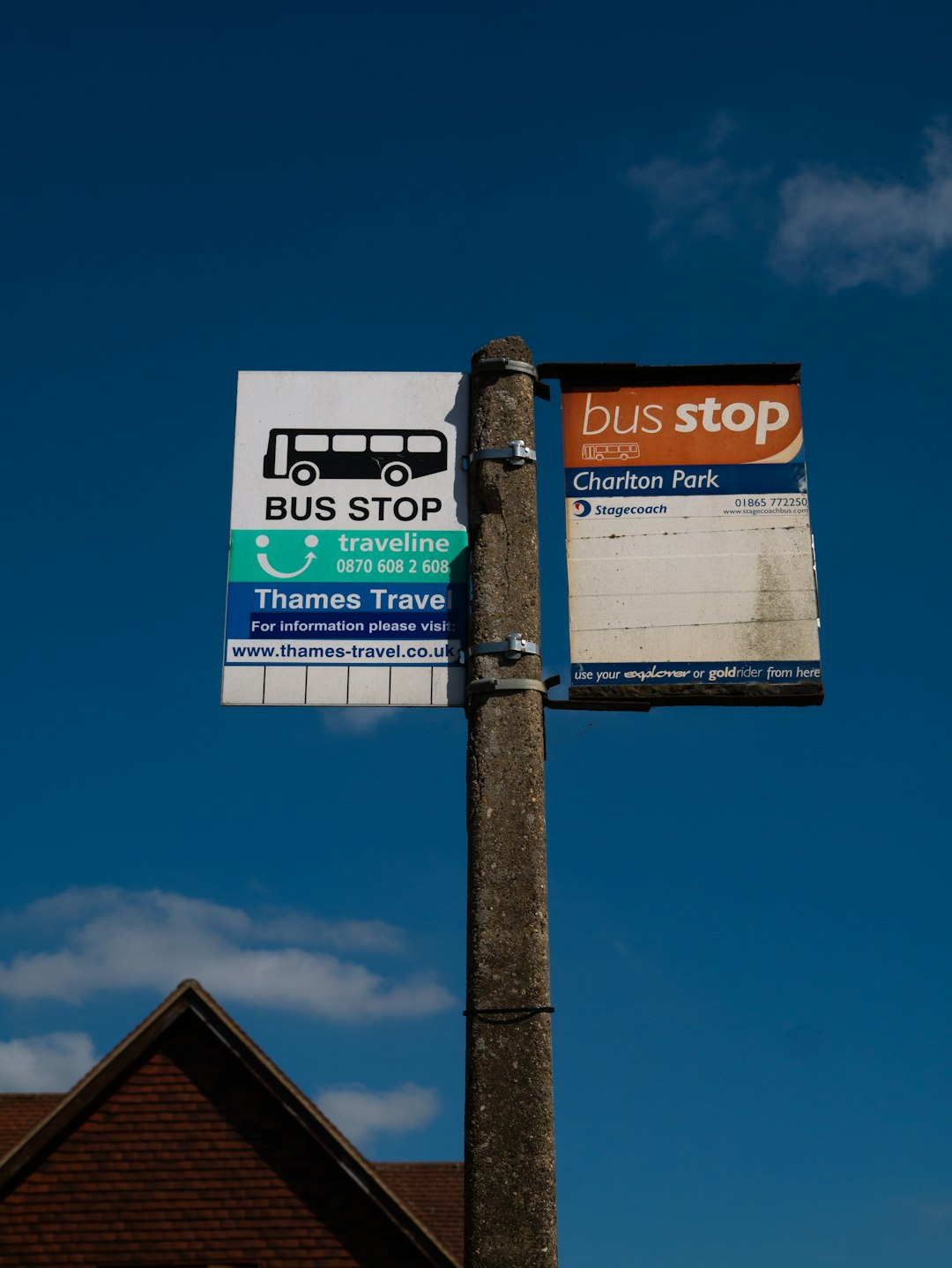 blue and white wooden signage