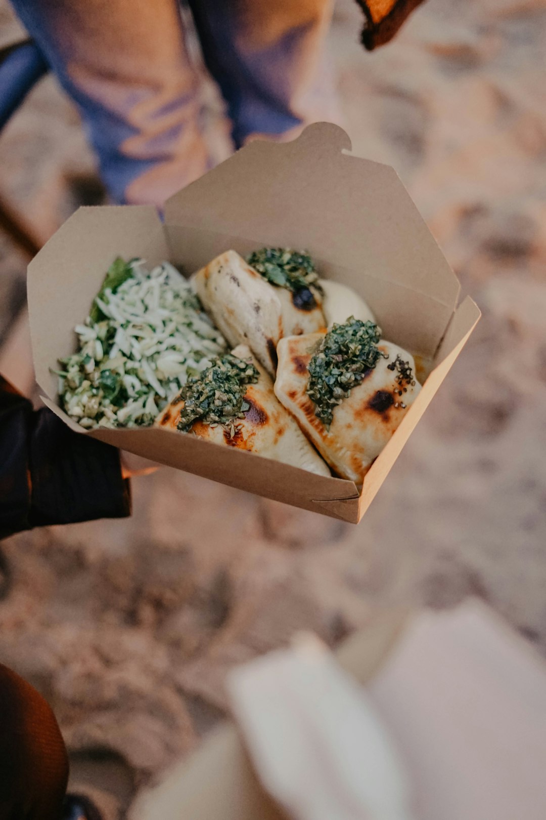 green vegetable in brown carton