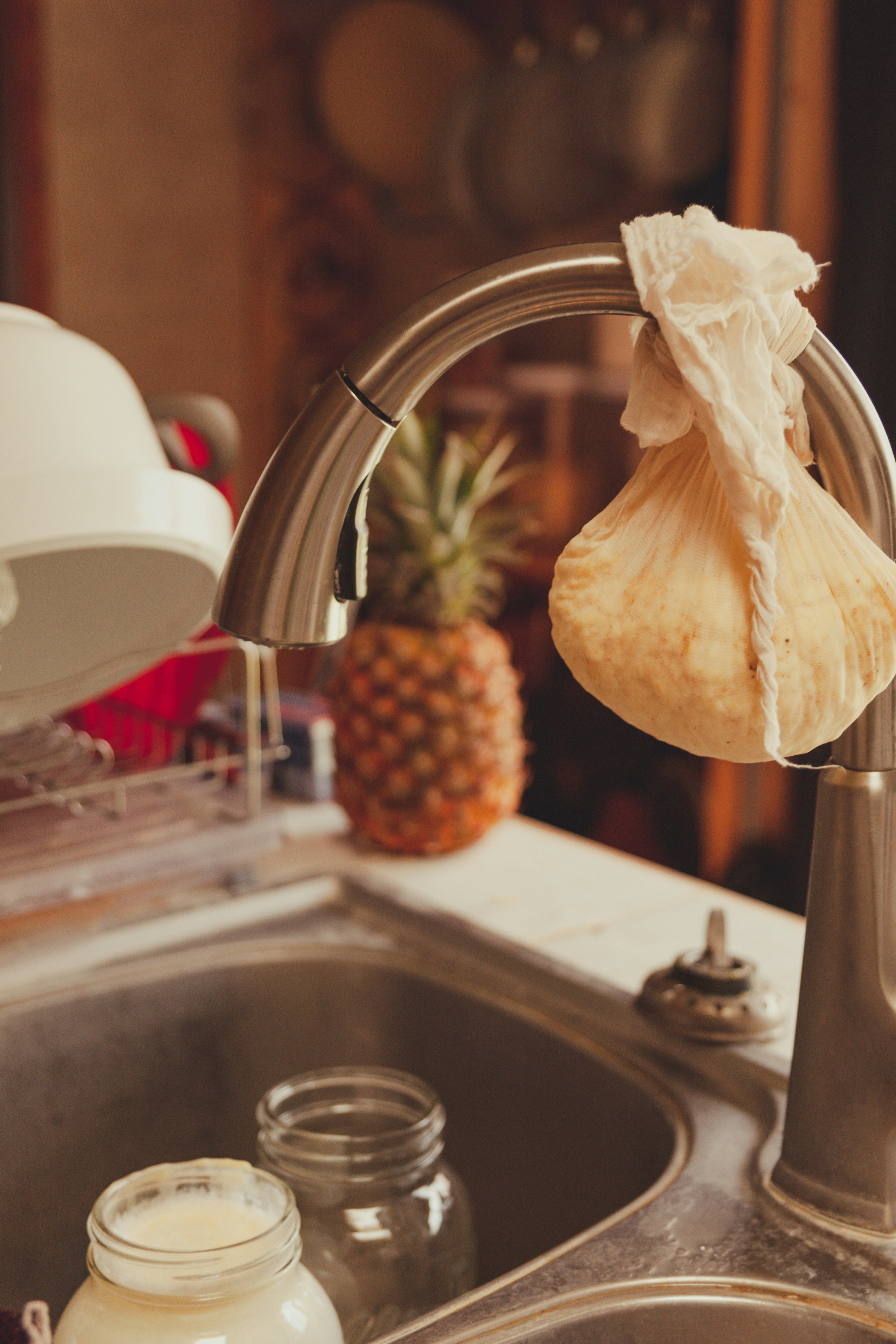 pineapple fruit on stainless steel sink