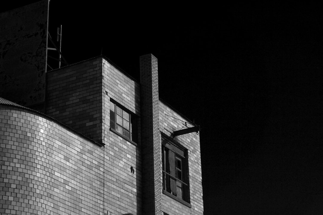 grayscale photo of concrete building