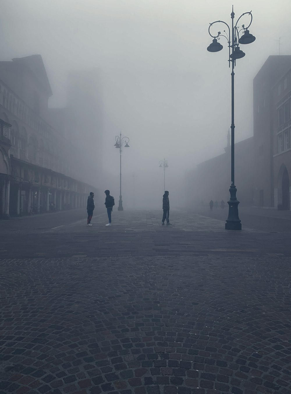 people walking on sidewalk during daytime