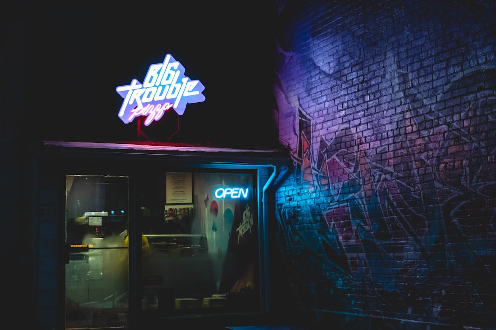 purple and white neon light signage