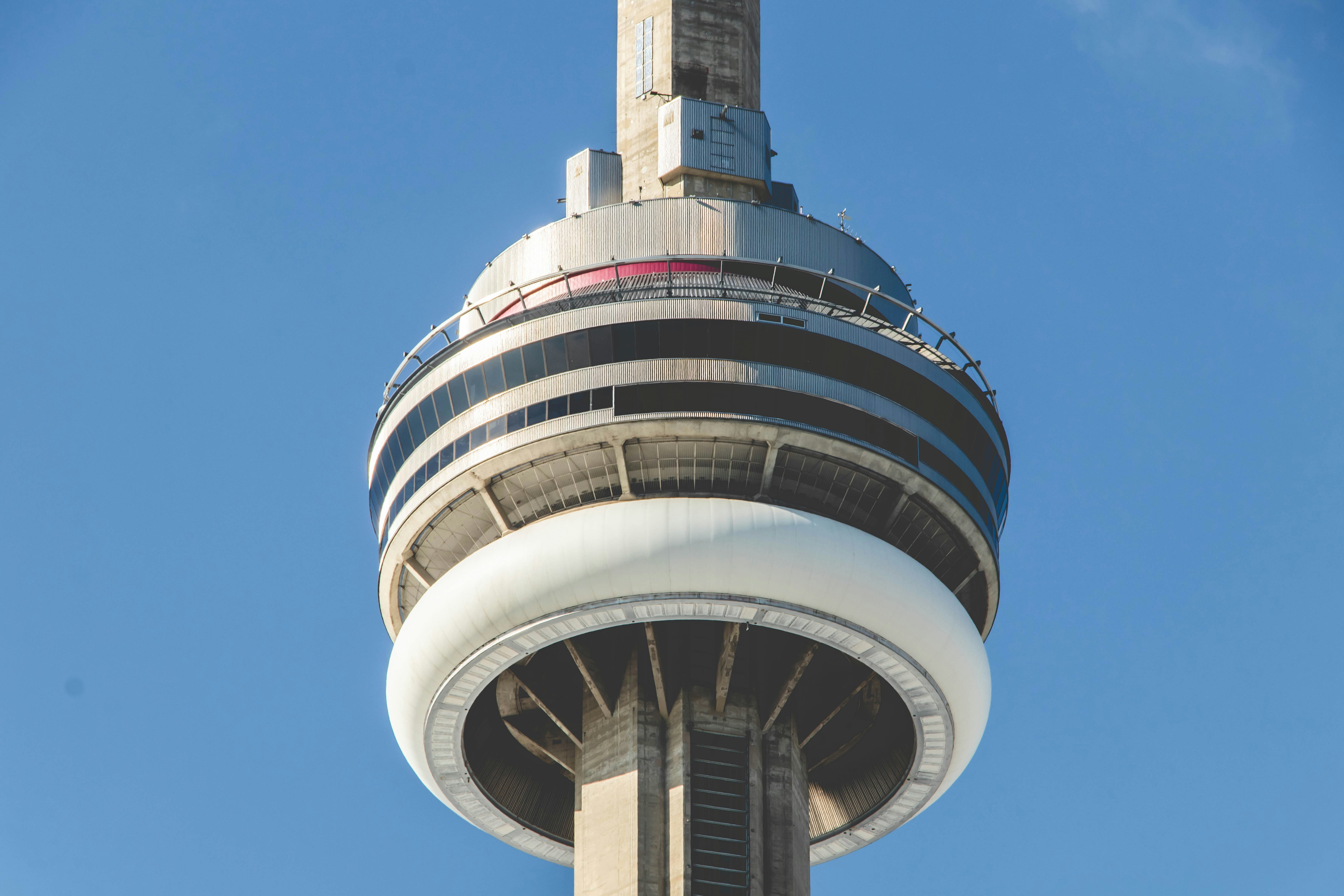 white and black concrete building under blue sky during daytime
