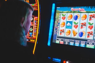 man playing slot machine game