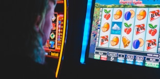 man playing slot machine game