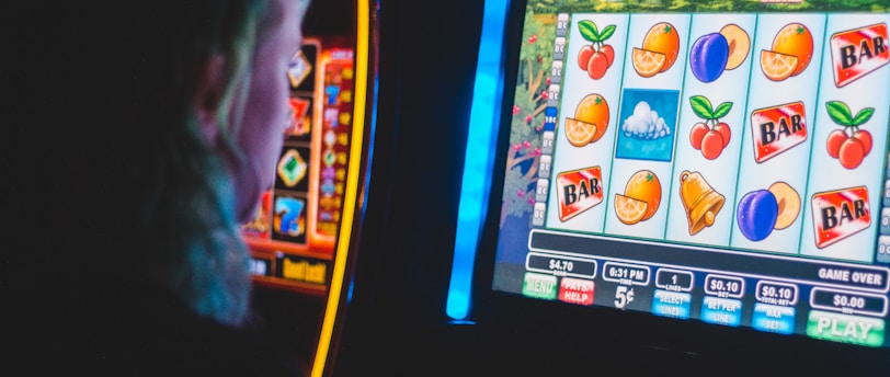 man playing slot machine game