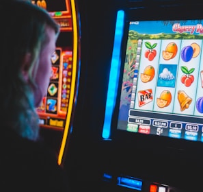 man playing slot machine game