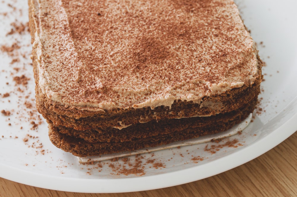 brown cake on white ceramic plate