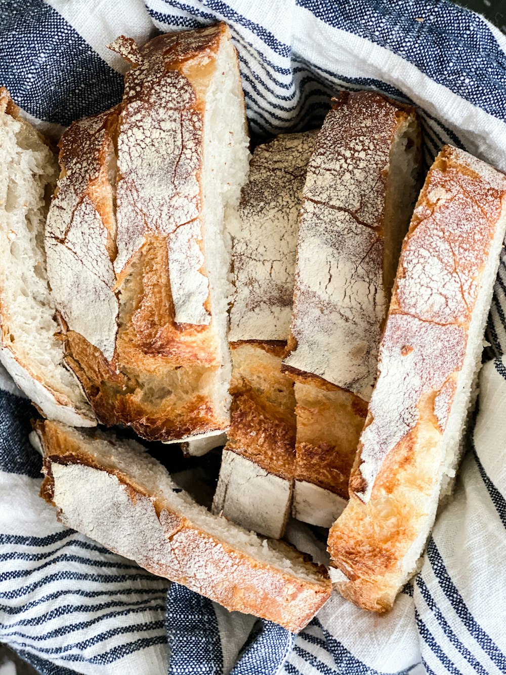 brown bread on white and black textile