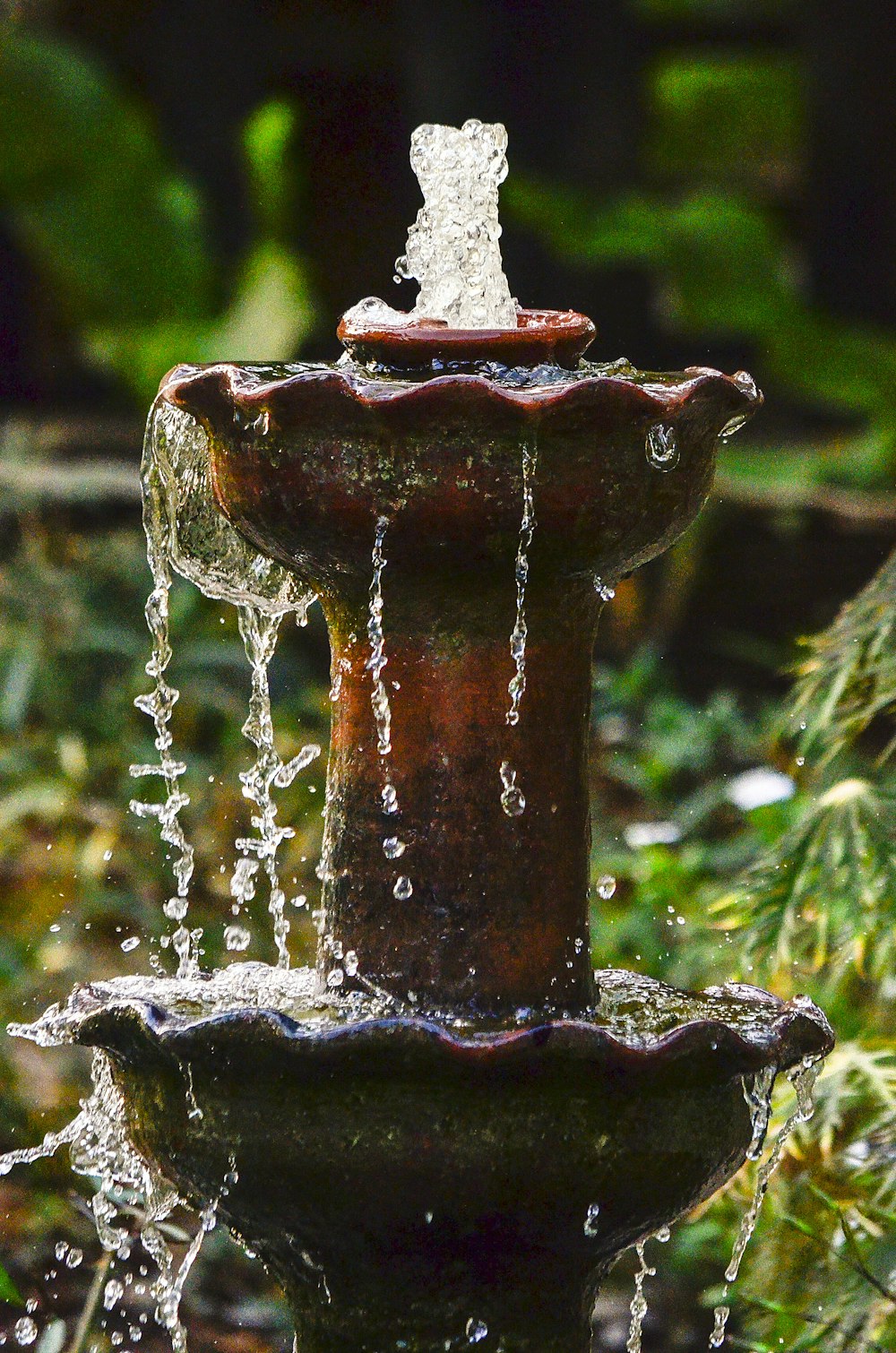 brown water fountain in tilt shift lens