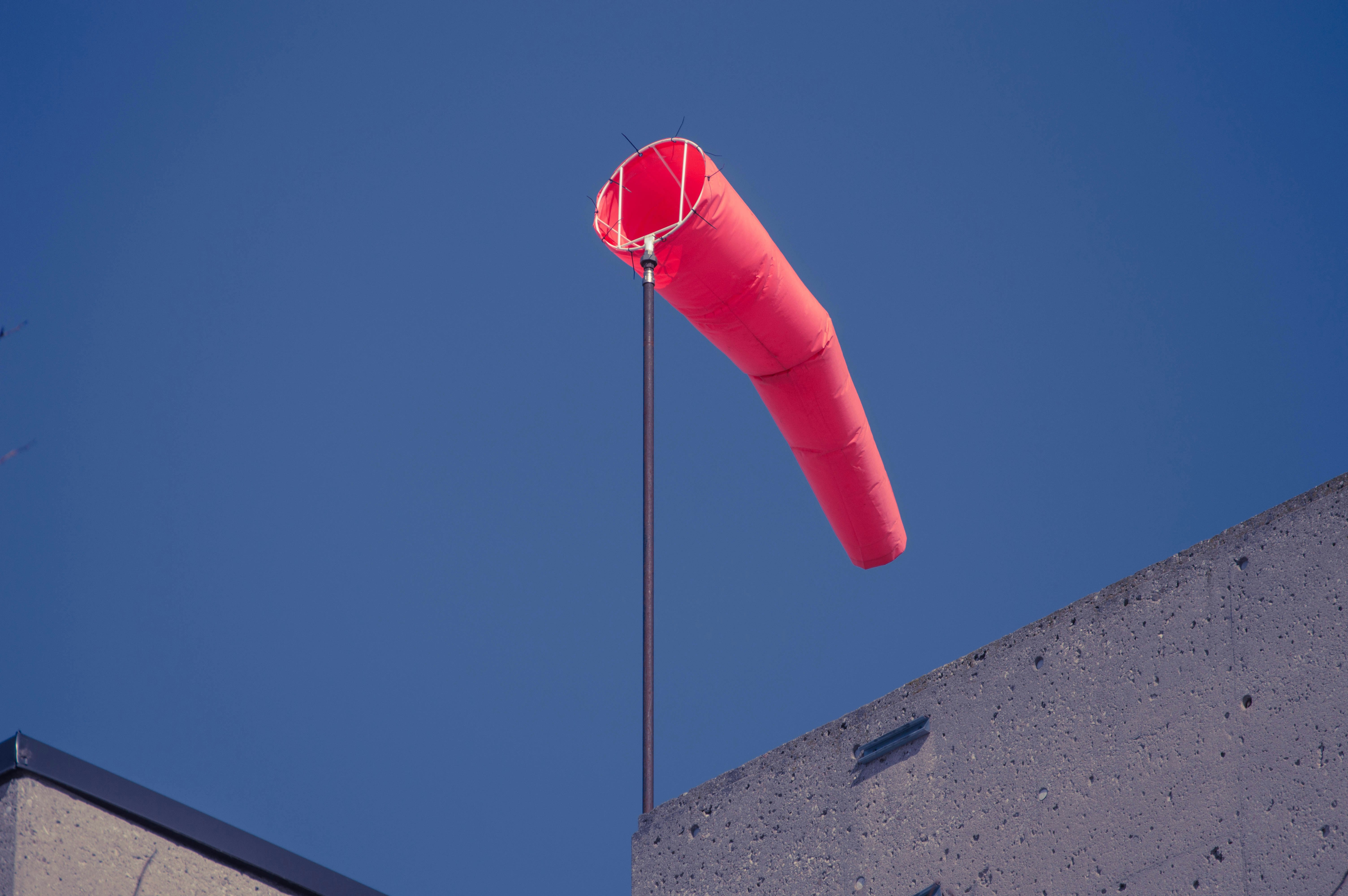 red paper lantern under blue sky during daytime