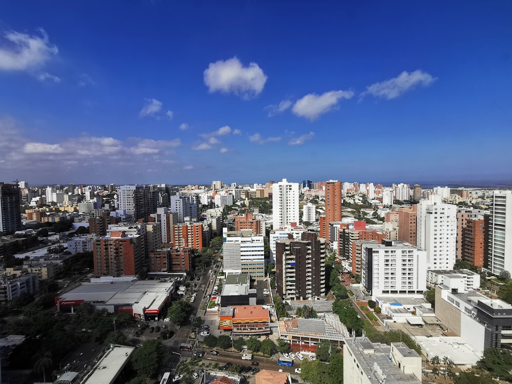 city buildings under blue sky during daytime