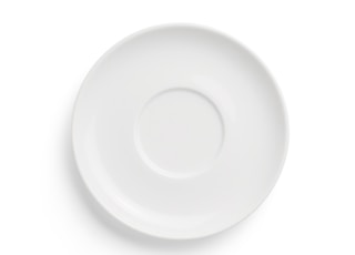 round white ceramic plate on white background