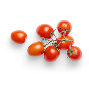 red tomatoes on white surface