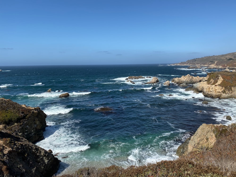 blue sea under blue sky during daytime