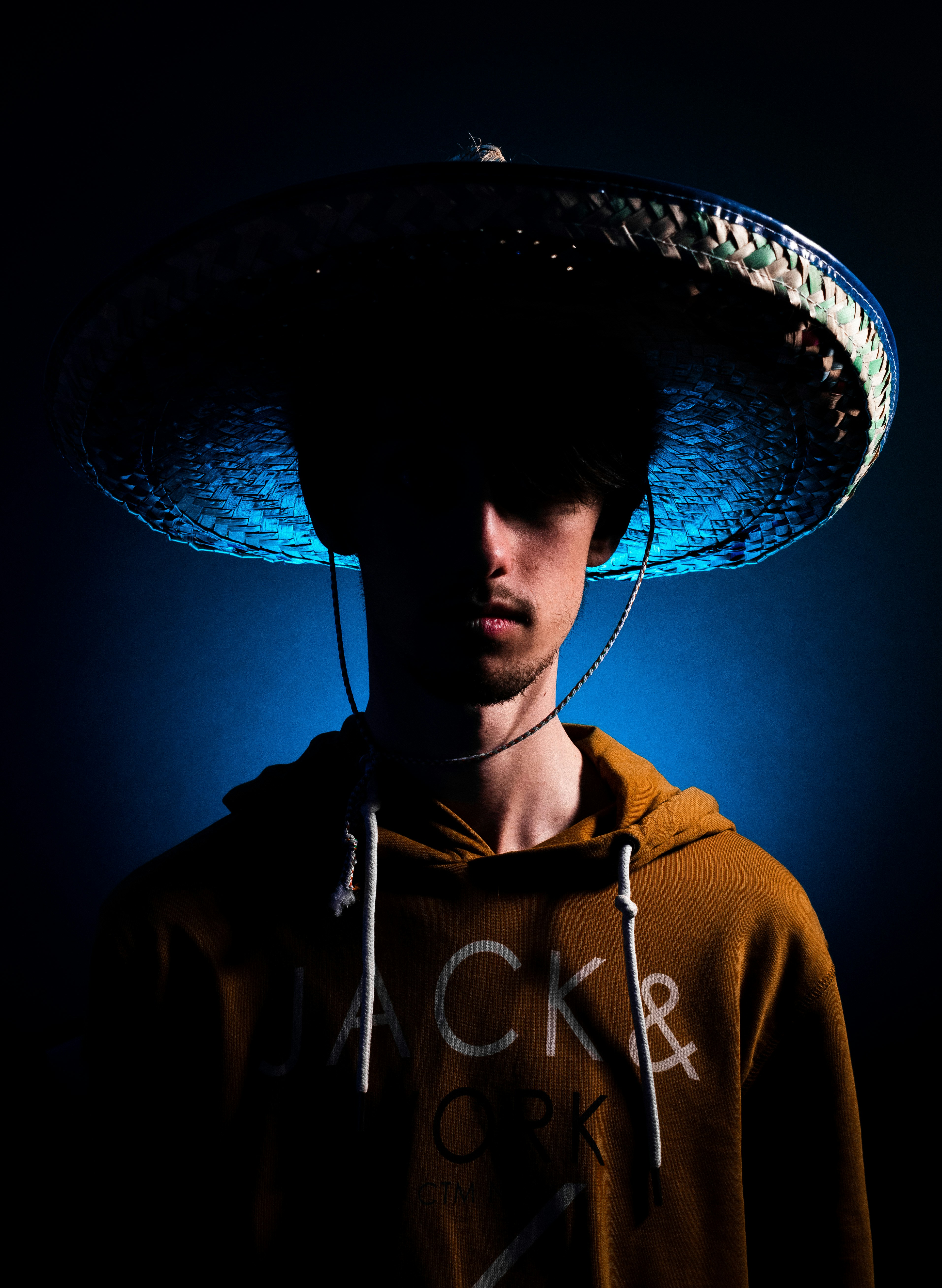 a man wearing a large hat on top of his head