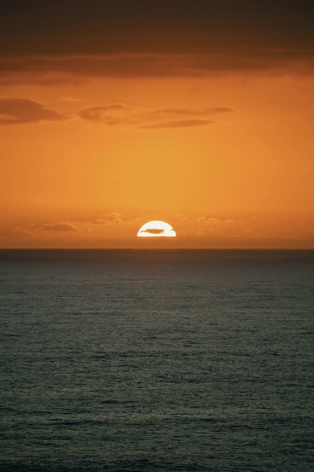 white dome tent on blue sea under blue sky during sunset