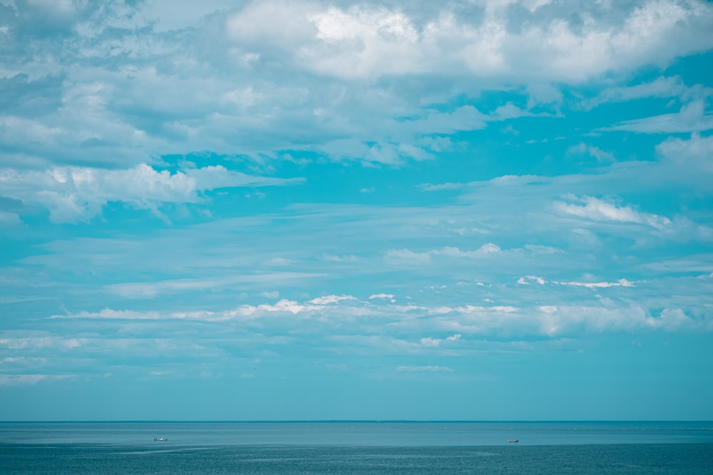 blue sky and white clouds over the sea