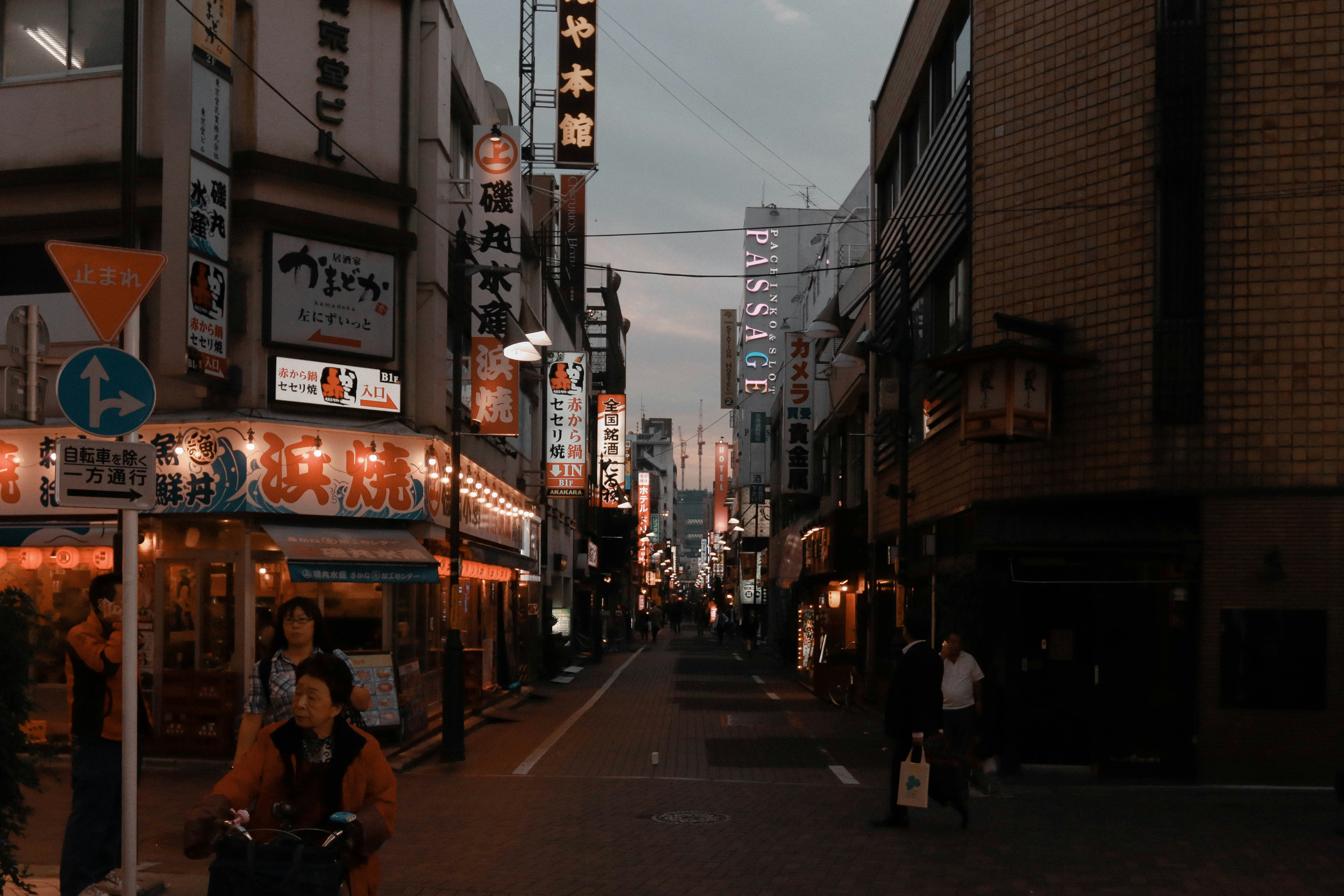 people walking on street during night time, 