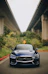 black bmw m 3 parked on gray asphalt road during daytime