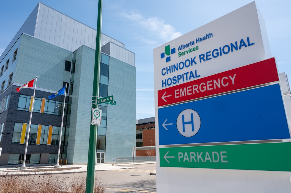 a hospital sign in front of a building