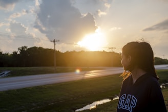 A friendly technician arriving promptly at a customer's home during sunset.