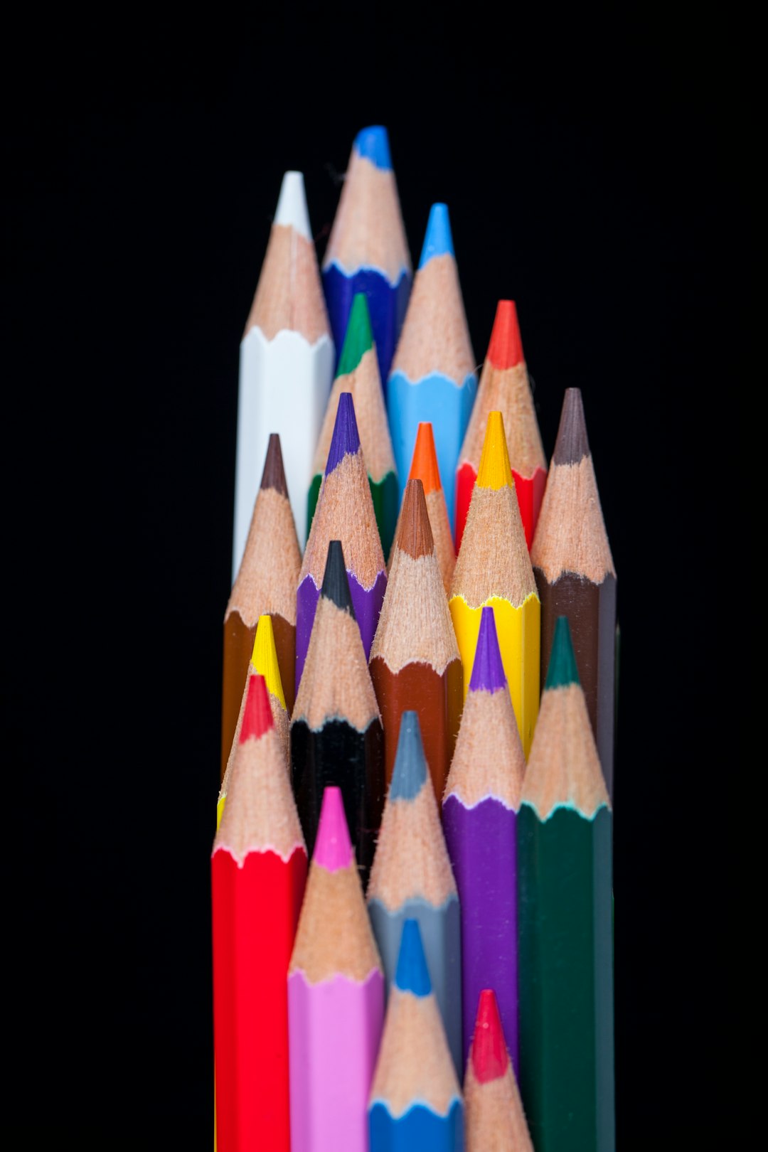 multi colored pencil on white background