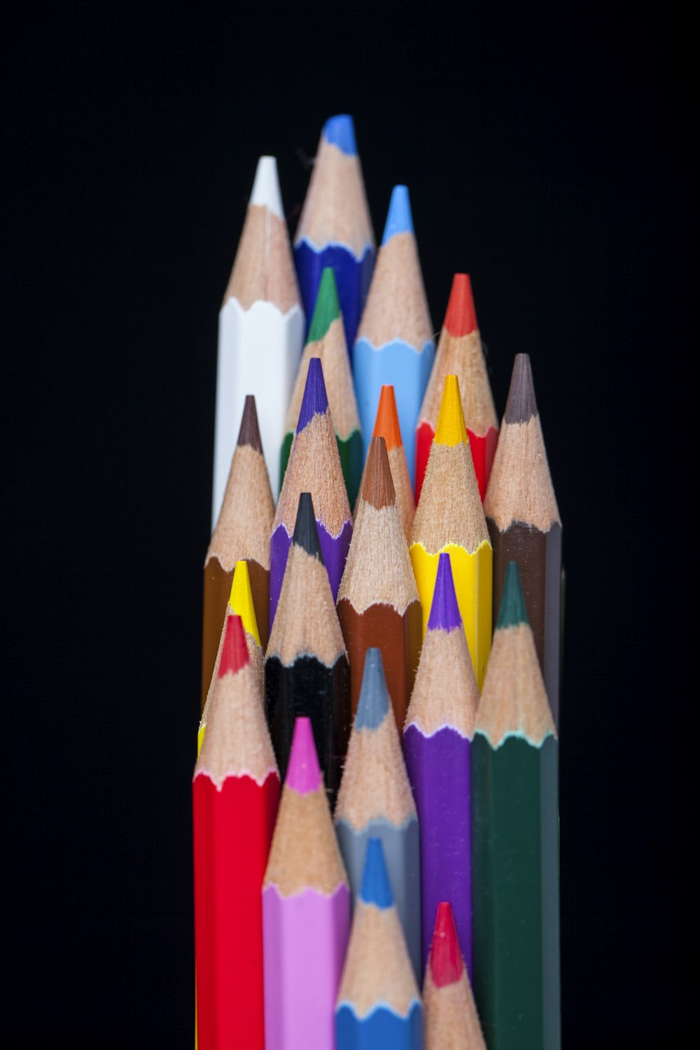 multi colored pencil on white background