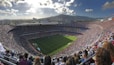 a stadium full of people watching a soccer game