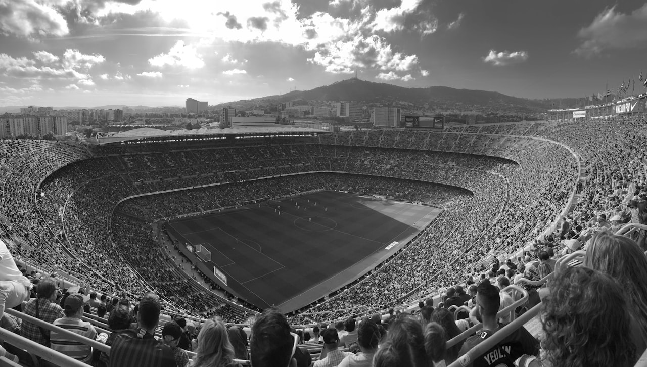 Camp Nou full of people watching a soccer game