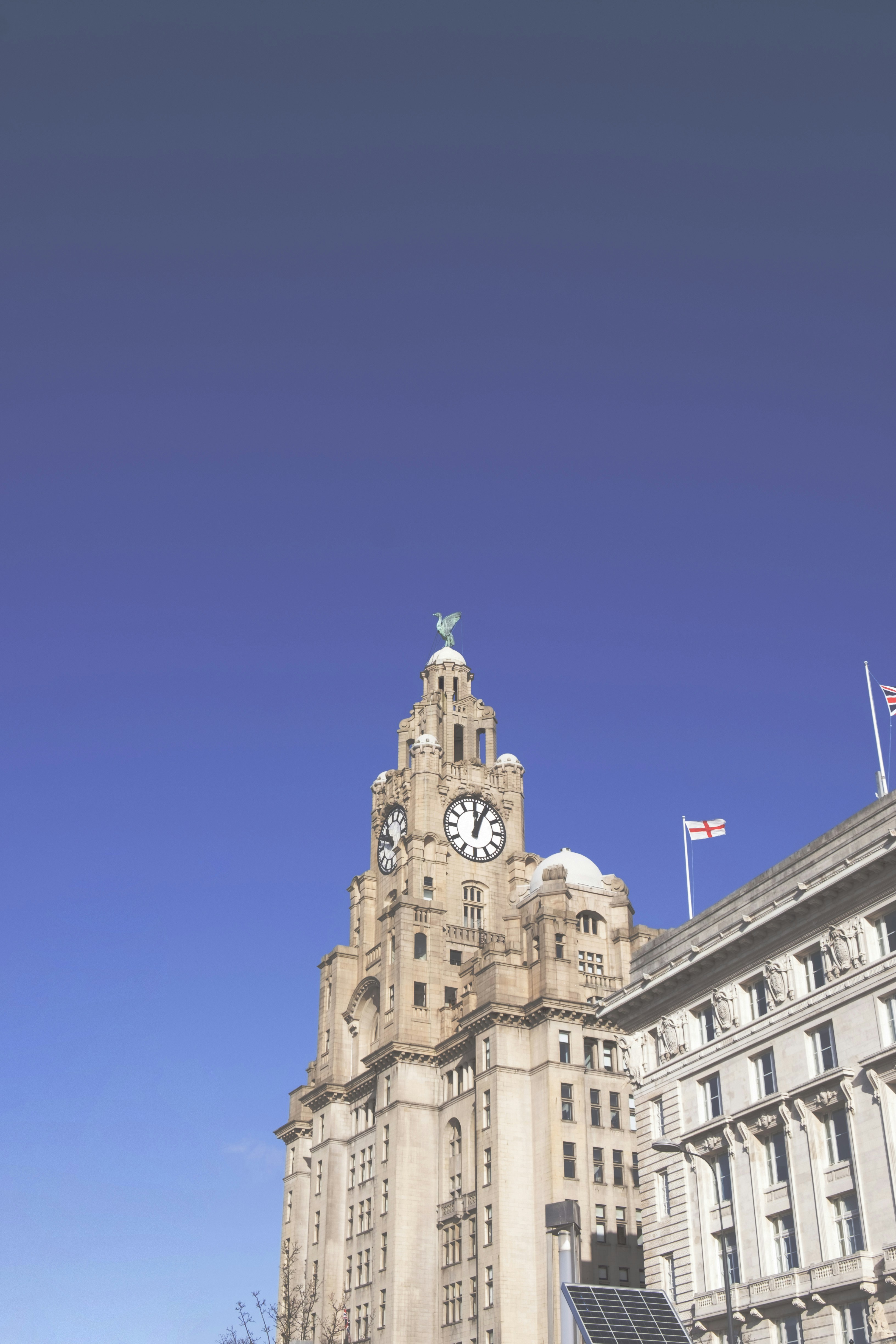 a tall building with a clock on the top of it