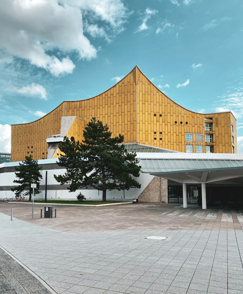 brown and white concrete building under blue sky during daytime