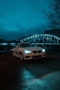 white bmw m 3 on road during night time