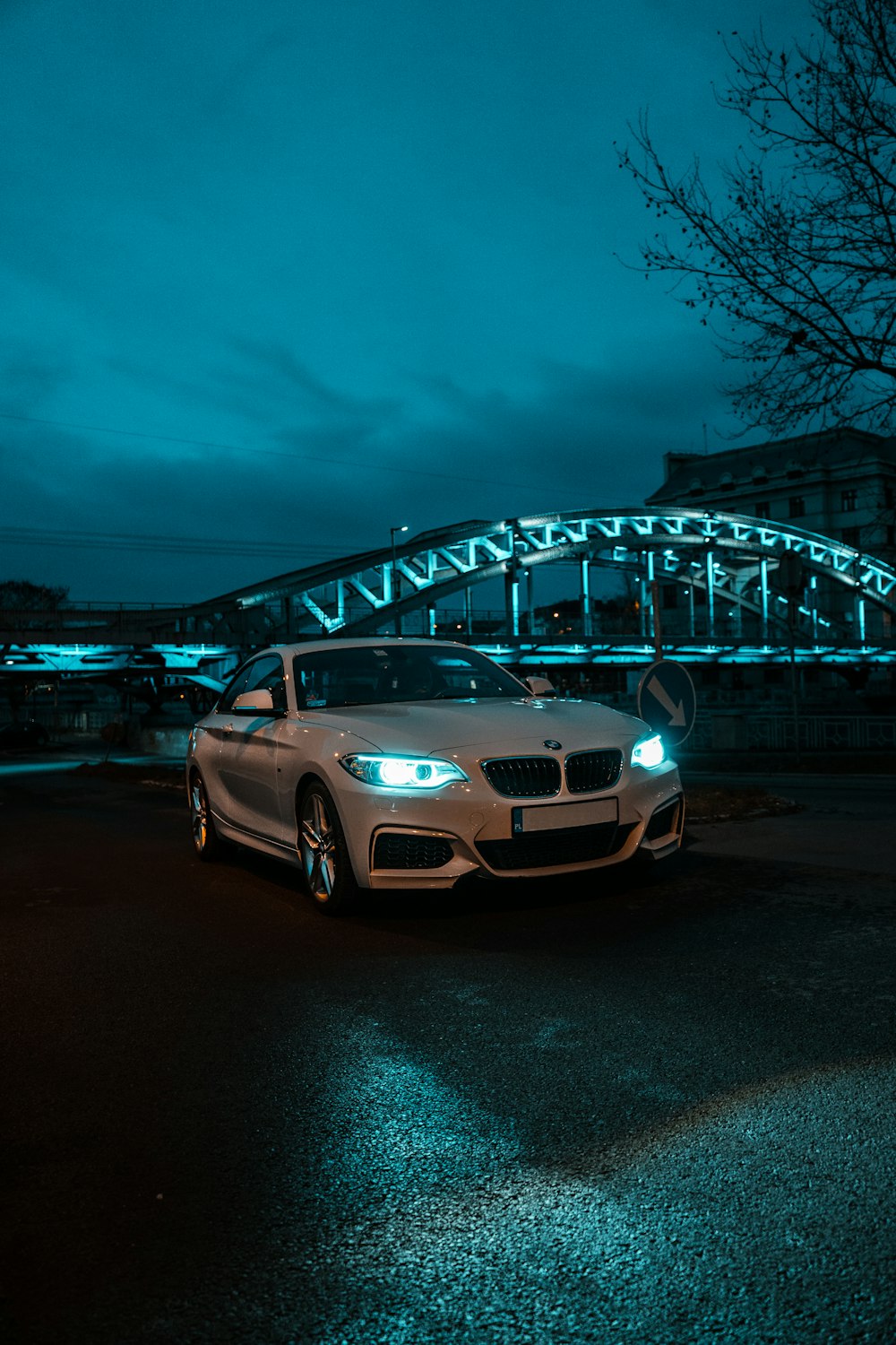 white bmw m 3 on road during night time