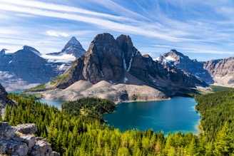 A breathtaking landscape of mountains and a clear blue lake.