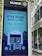 A public information screen installed by InLinkUK, featuring a COVID-19 safety message from the Mayor of London. The sign advises staying home to save lives, allowing only necessary outings for food, health reasons, exercise, or essential work. The illustration includes a house with individuals visible in the windows, surrounded by city buildings.