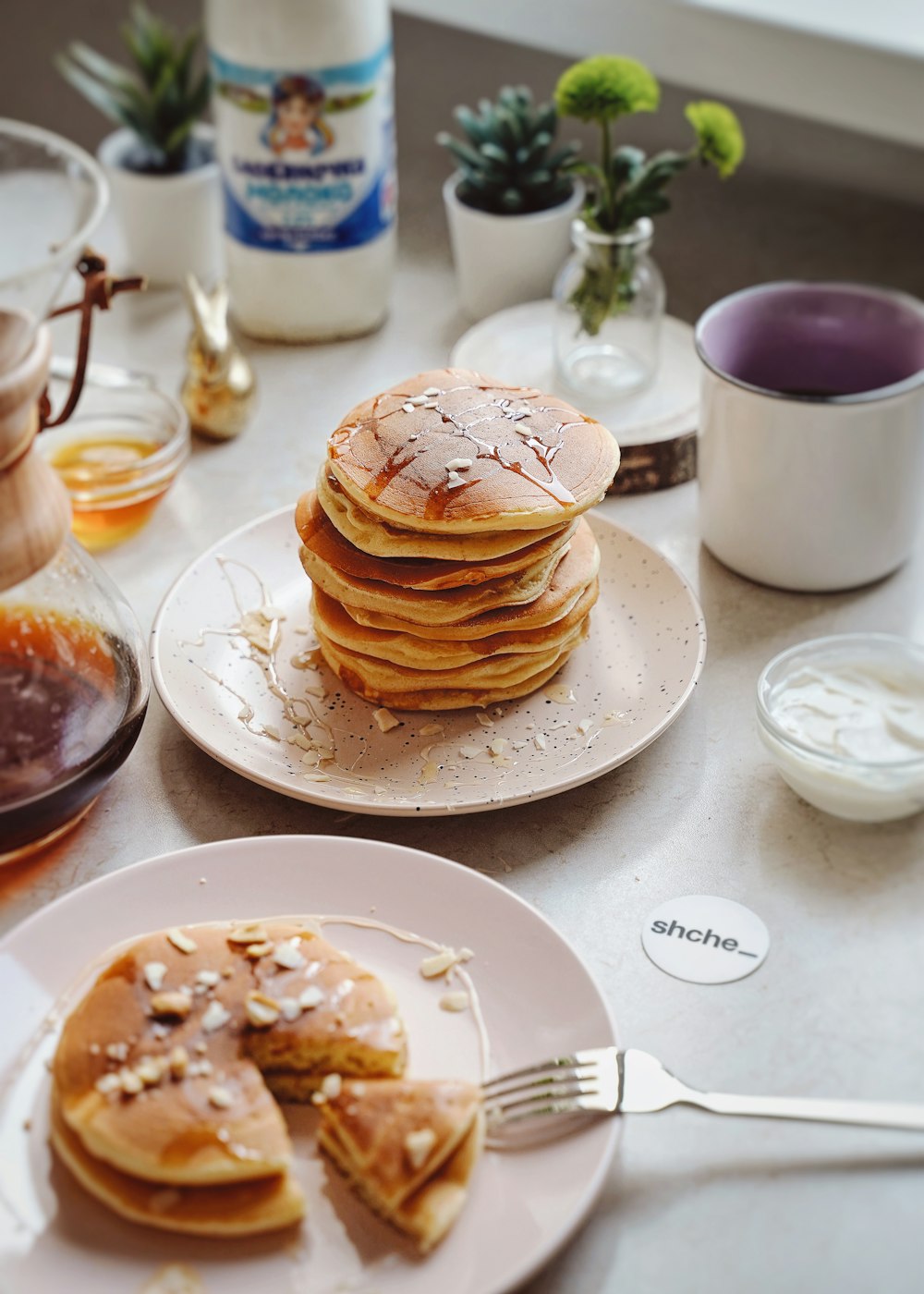 brown pancakes on white ceramic plate